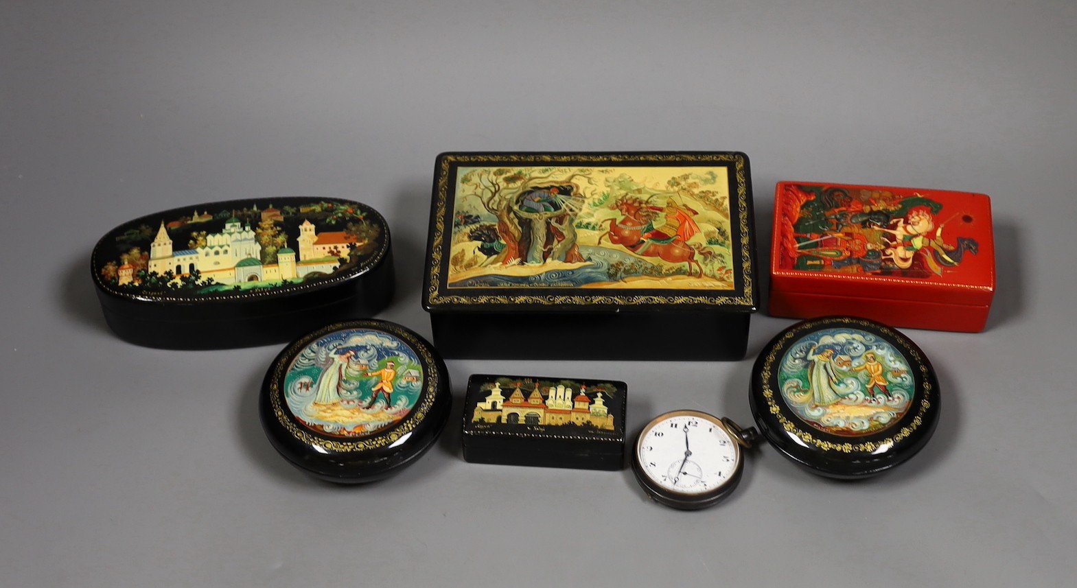 A selection of six Russian papier mache boxes, largest 14.5cm long
